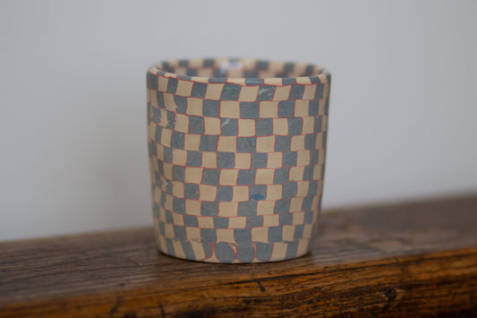 blue and white checkered cup