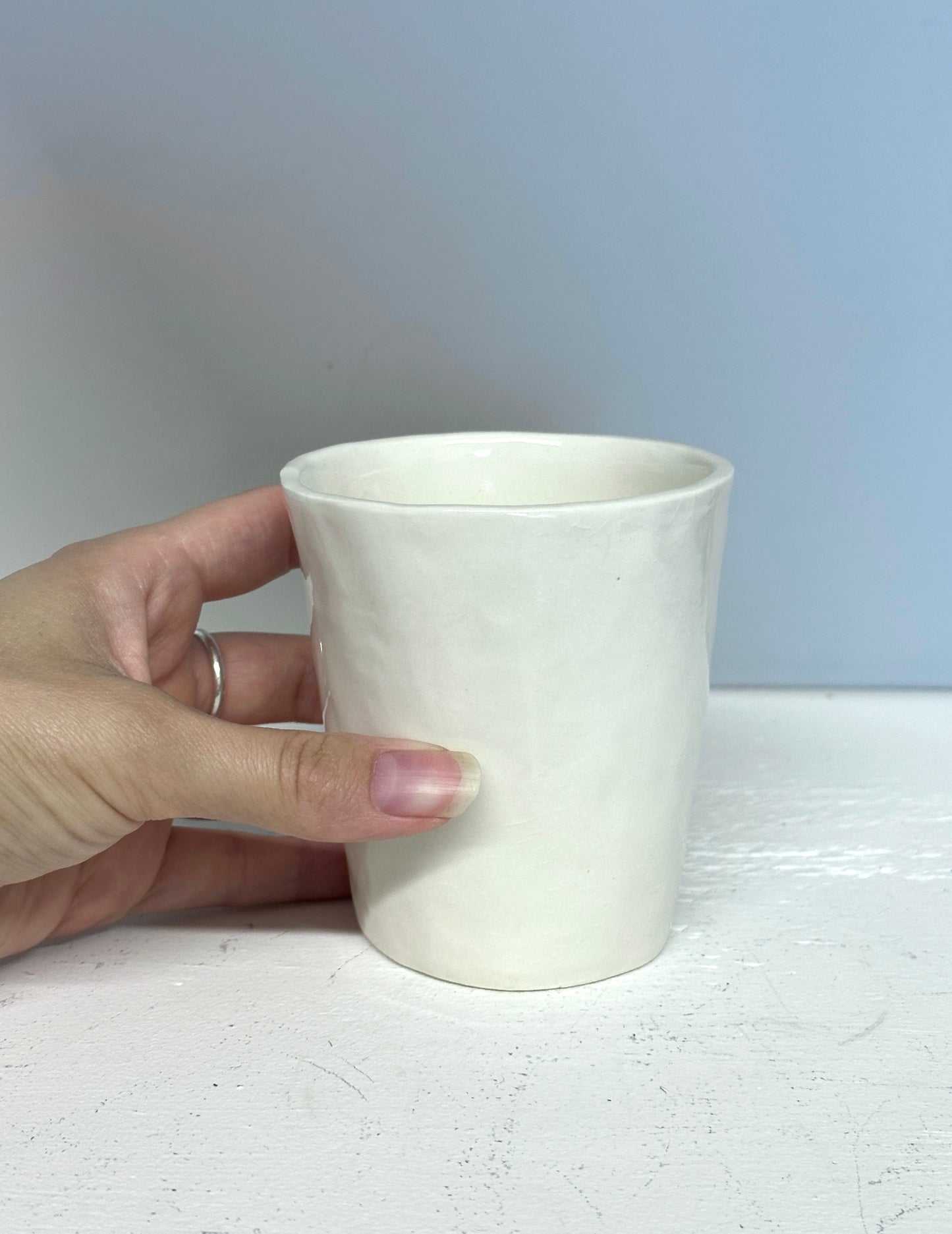 glossy white cup