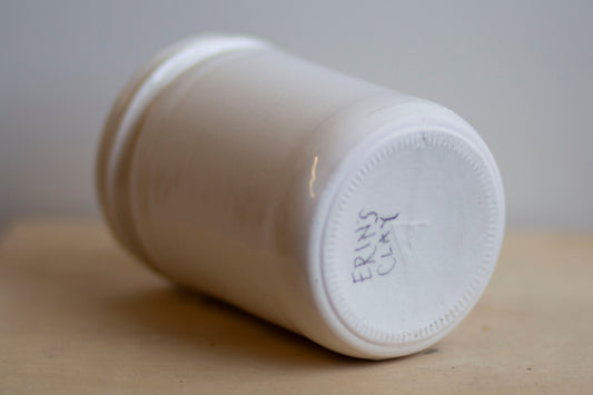 glossy white jar shaped cup