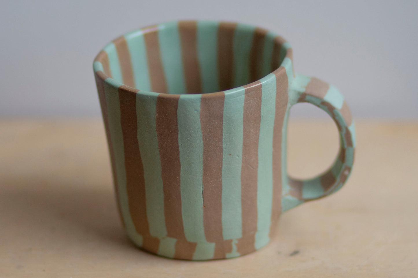 small bermuda and tan mug