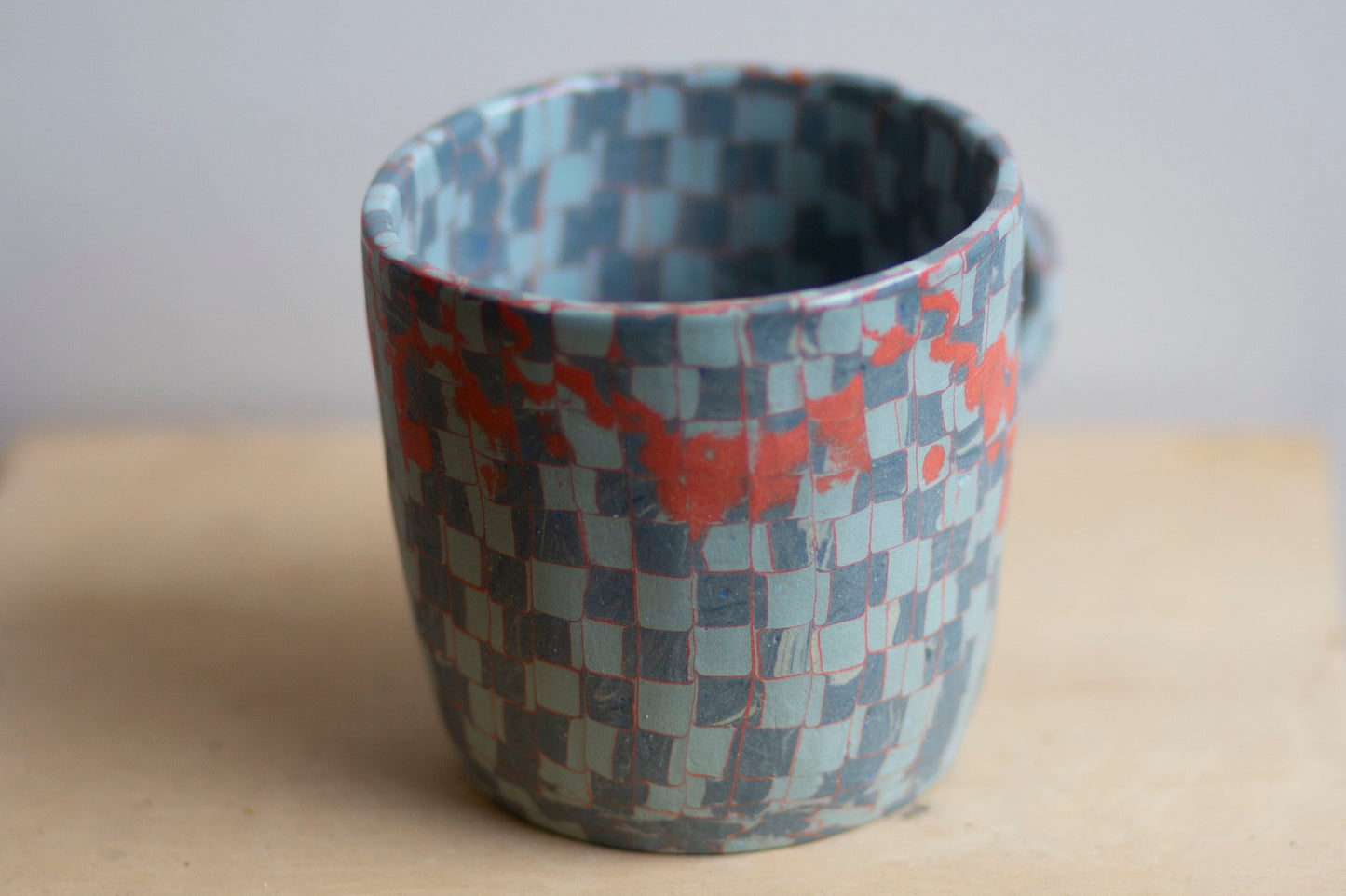 blues and orange mug