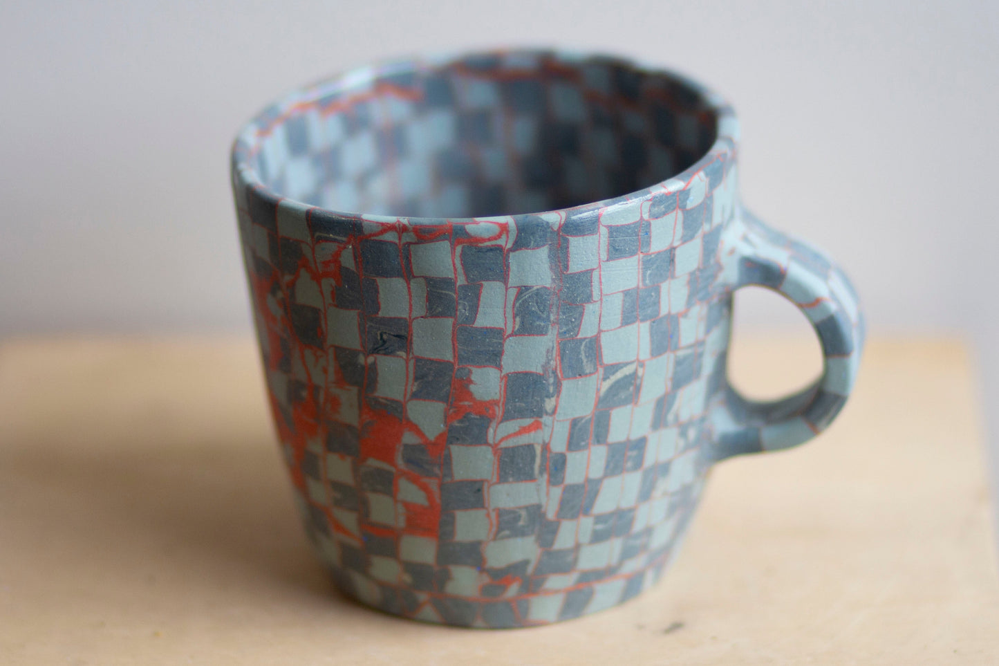 blues and orange mug