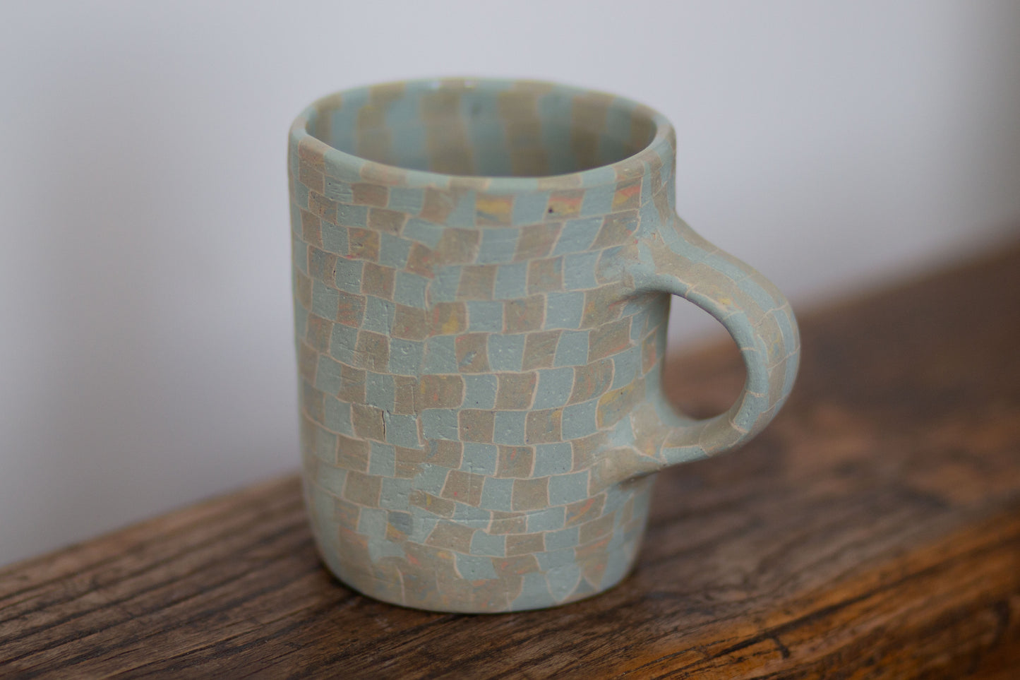 light blue checkered mug