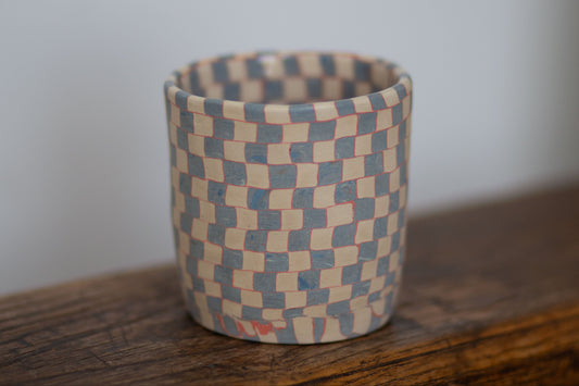 blue and white checkered cup