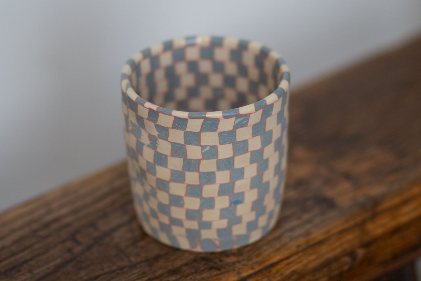 blue and white checkered cup