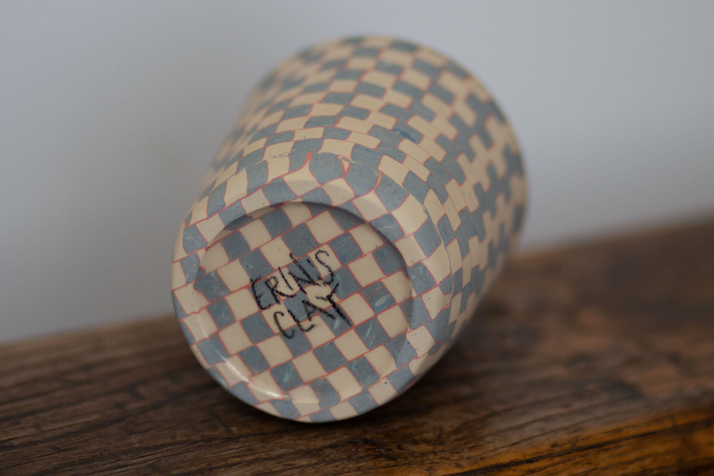 blue and white checkered cup