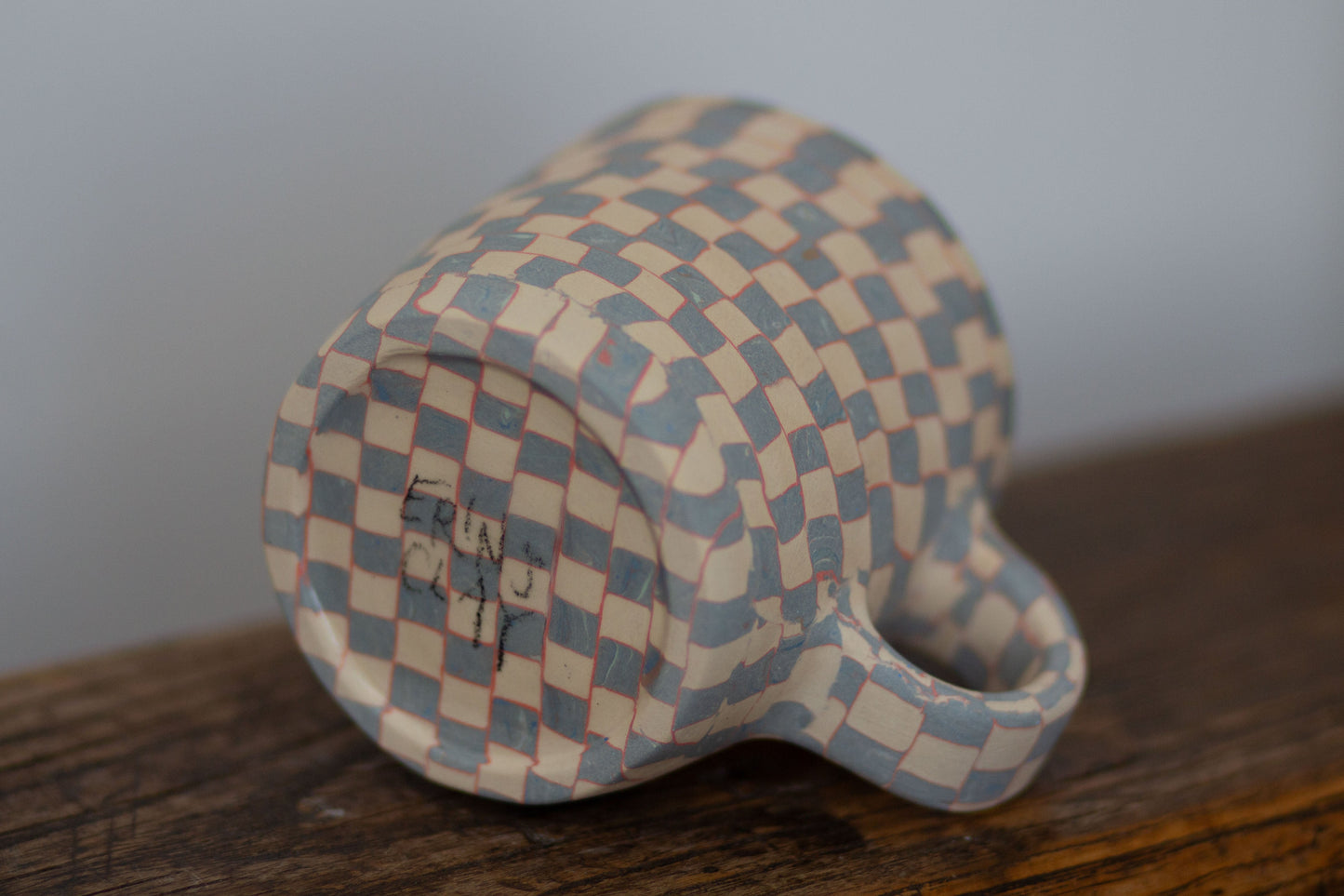 blue and white checkered mug