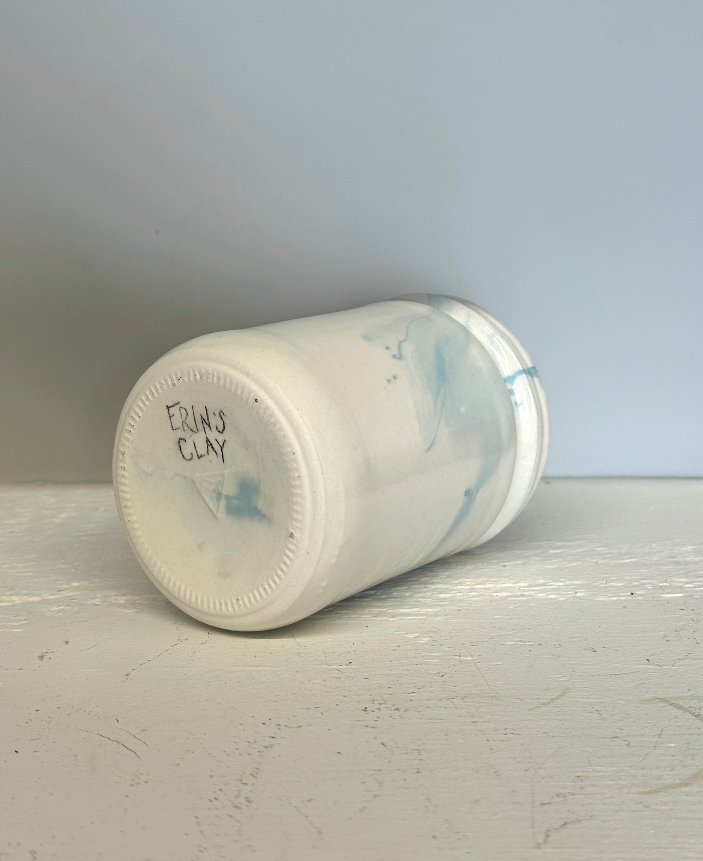 glossy jar shaped cup in white and blue