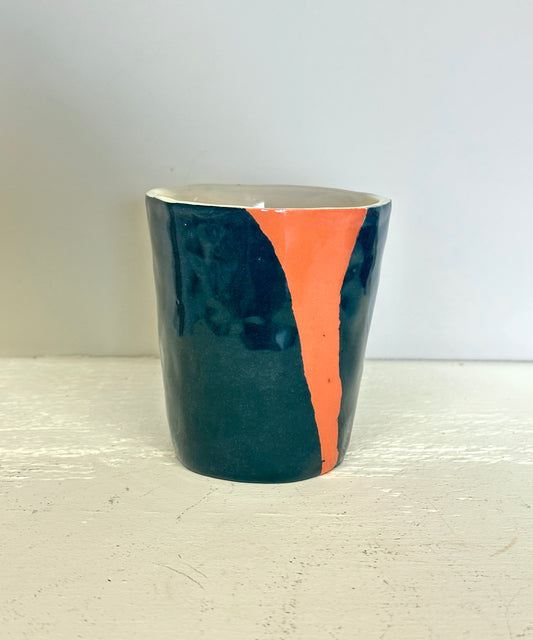 teal and lobster red cup